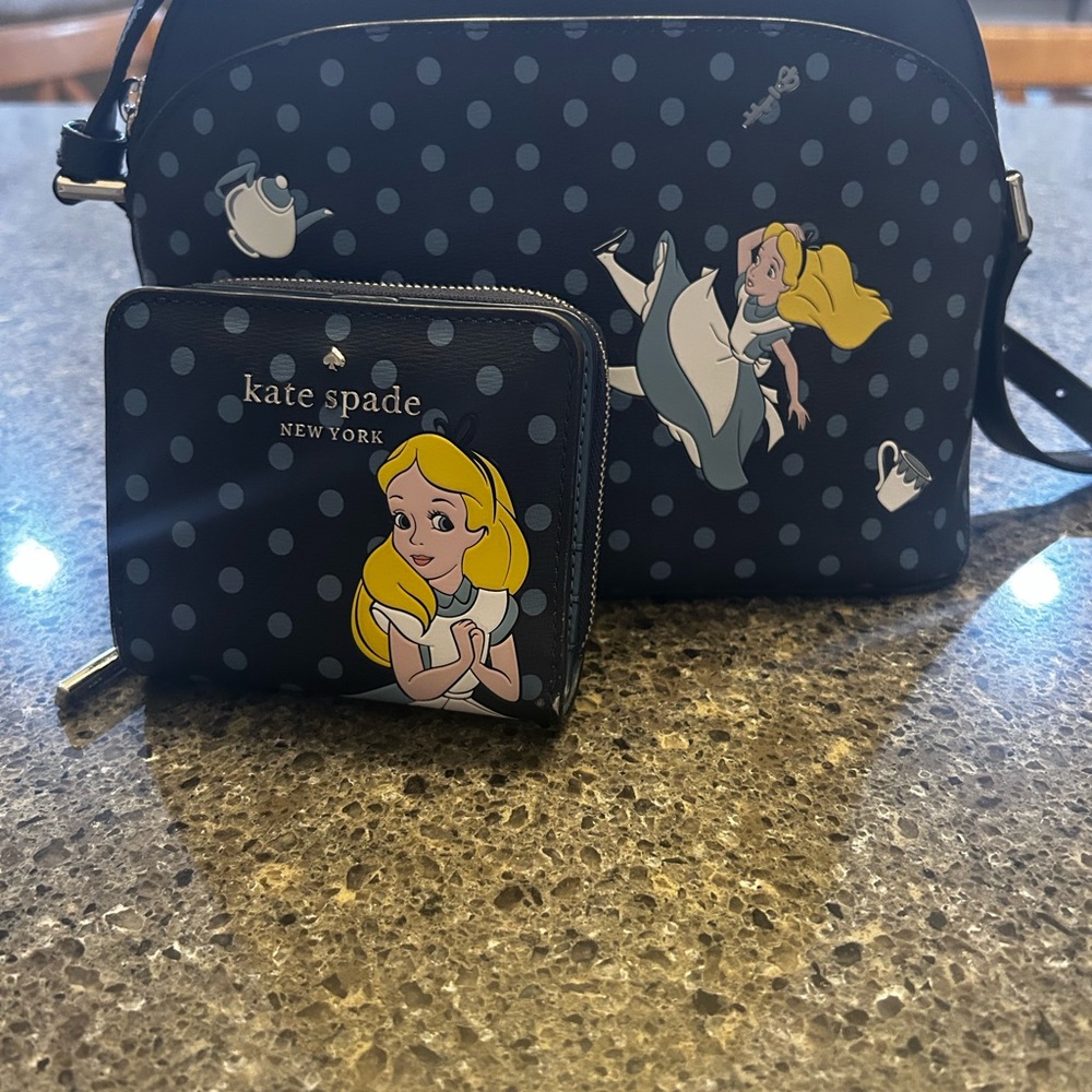 *SOLD
Kate Spade Navy Blue Alice in Wonderland Bag and Wallet